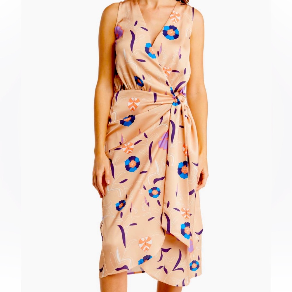 floral print elevates a sleeveless midi dress fashioned in a wrap silhouette